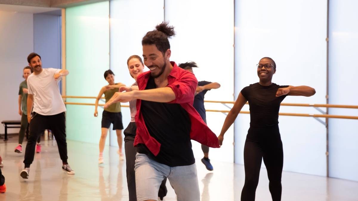 Thursday Night Hype dance class, participants following their teacher at Trinity Laban