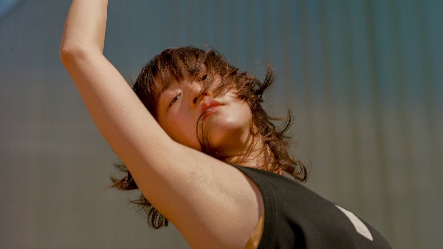 Dancer in front of Laban Trinity_Laban_Rebrand_092024_photo by Maya Asha Jeffers