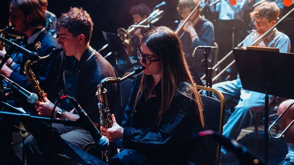 A jazz band performing on stage.