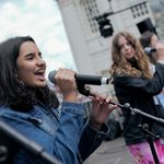 Young Musicians' Summer School, singers perform on stage at the old royal naval college