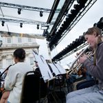 Young Musicians' Summer School, trumpet players perform on stage at the old royal naval college
