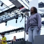 Young Musicians' Summer School, vocalist, saxophone and trumpet player perform on stage at the Old Royal Naval College
